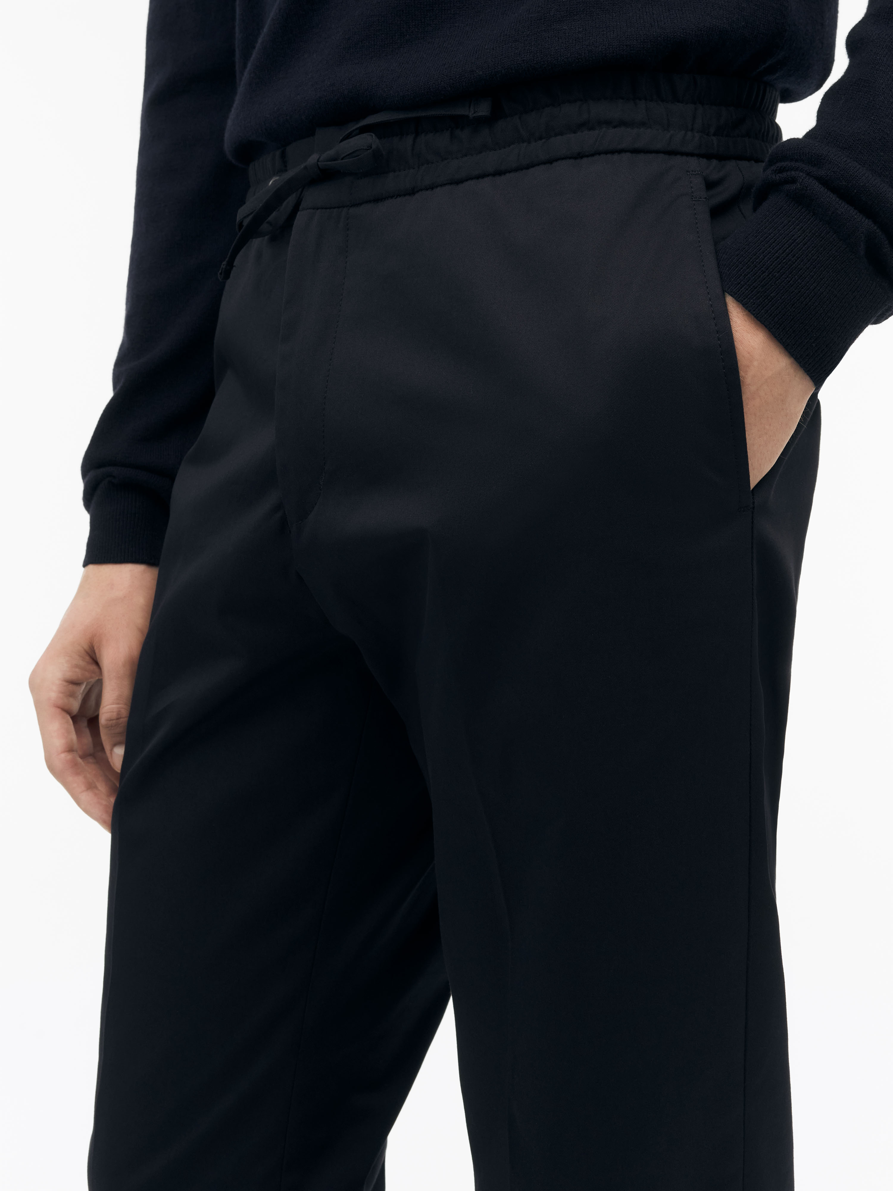 Details of black chinos